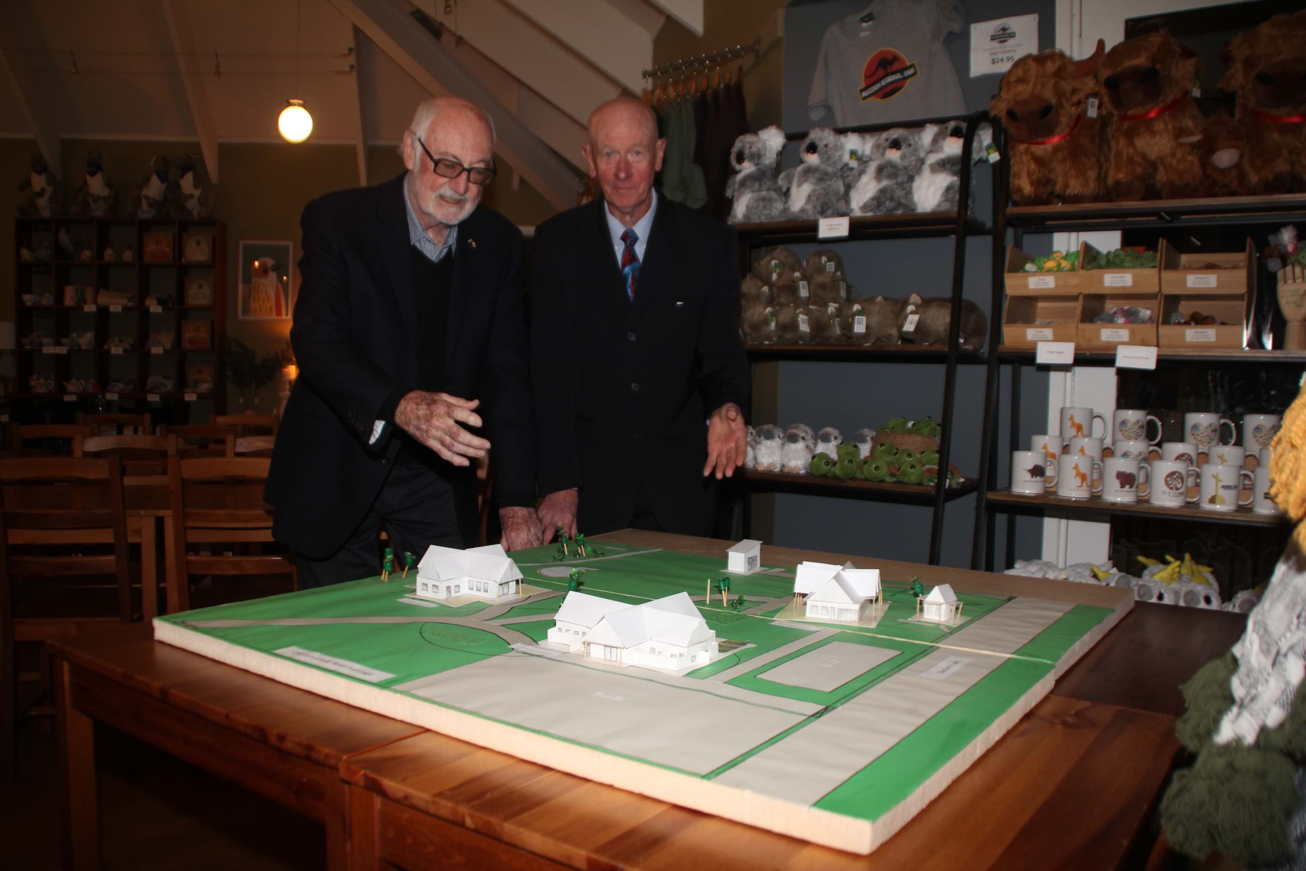 Athol Guy AO and Neil Pomroy looking over the site plan